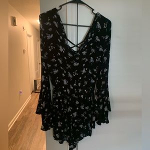 Hollister romper with bell sleeves and lettuce hem